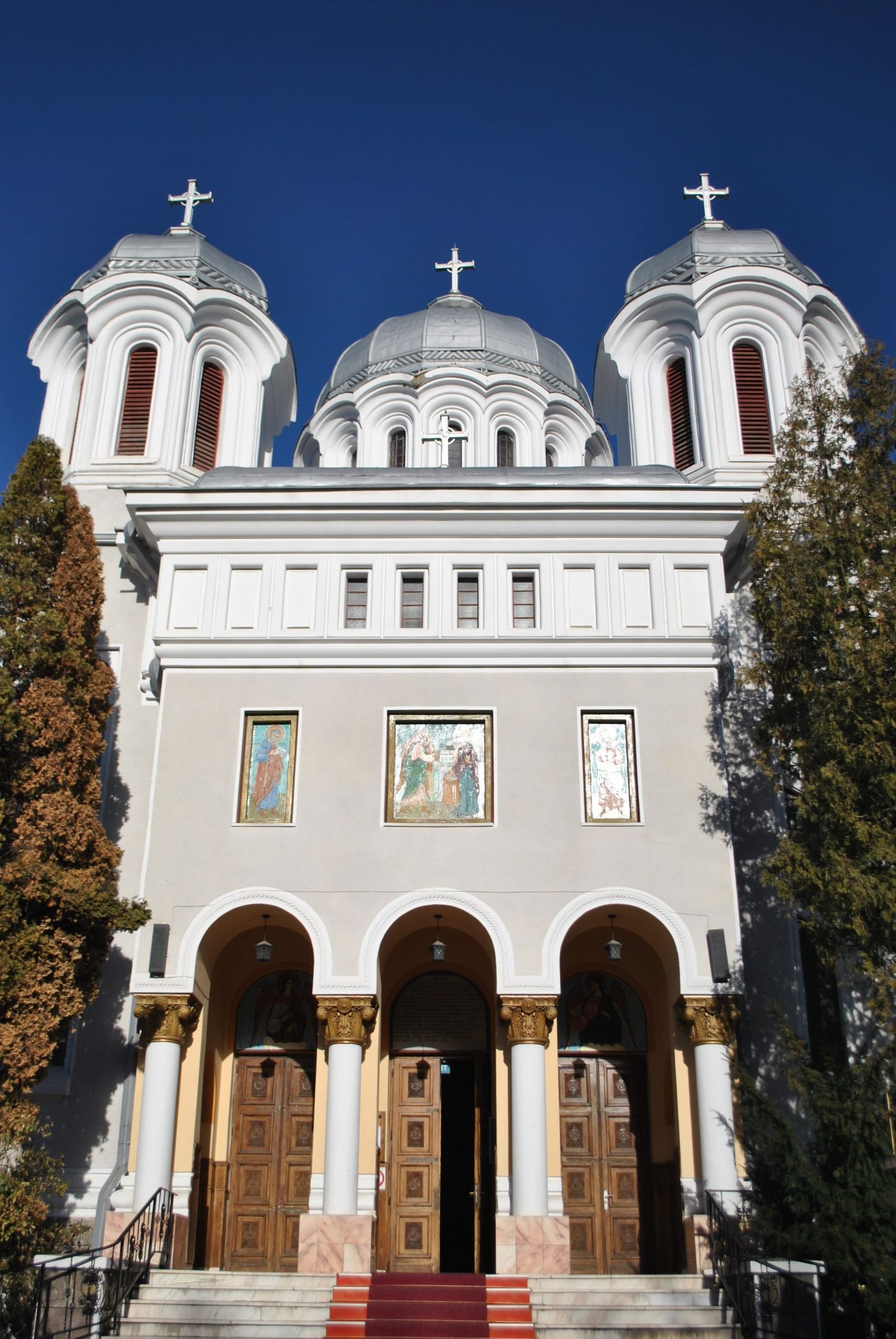 A grand Orthodox church under a blue sky