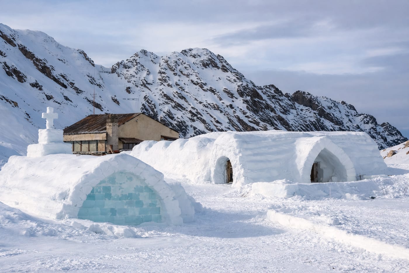 The Balea Lake Ice Hotel, built from snow and ice blocks on a snowy Carpathian mountainside